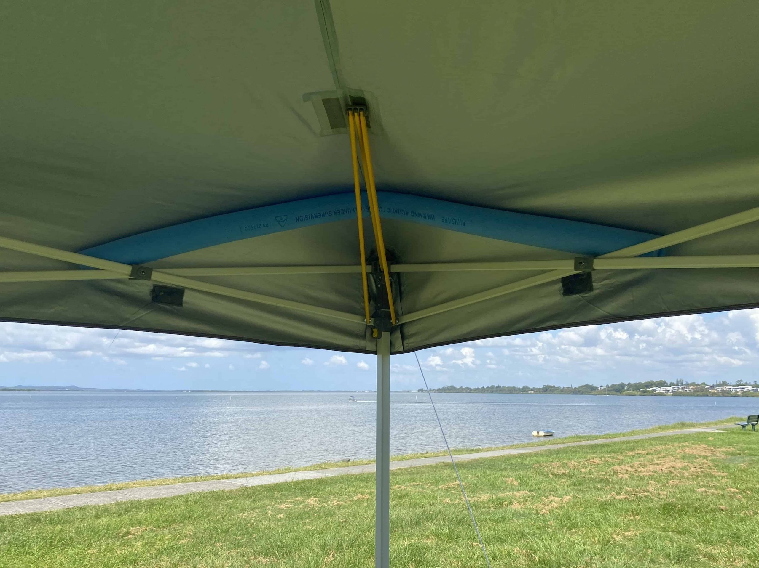 How to keep water from pooling on canopy, a pool noodle wedged into the underside of a pop up canopy