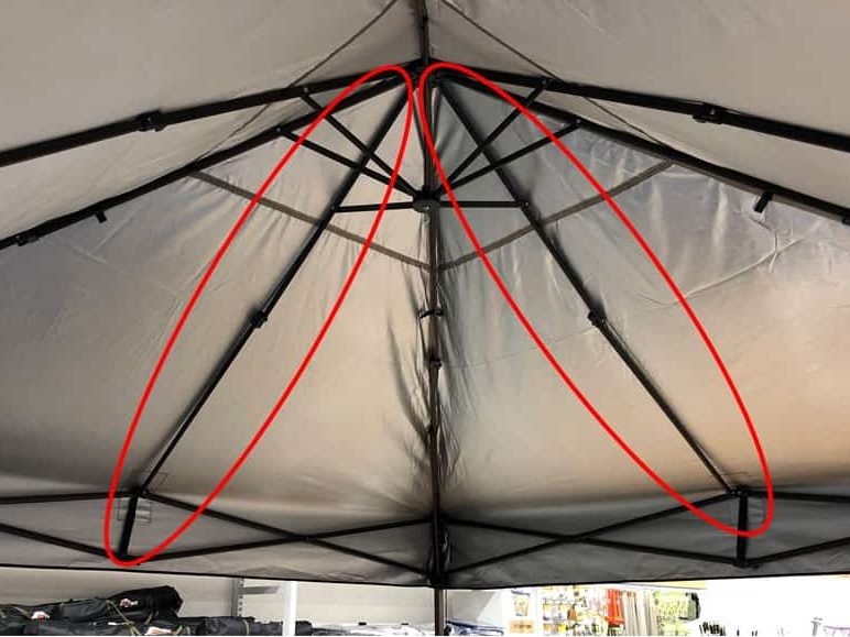 how to keep water from pooling on canopy, an image of the underside of a pop up canopy