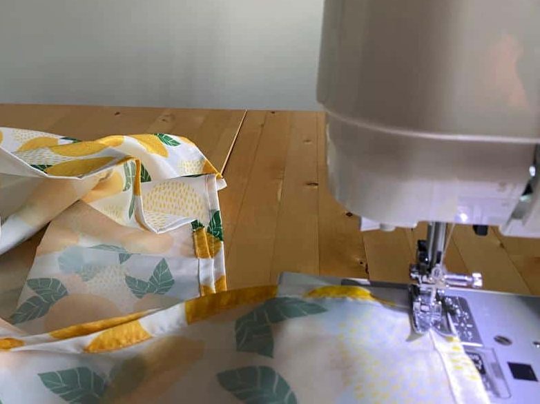 diy beach shade - sewing machine joining the material together